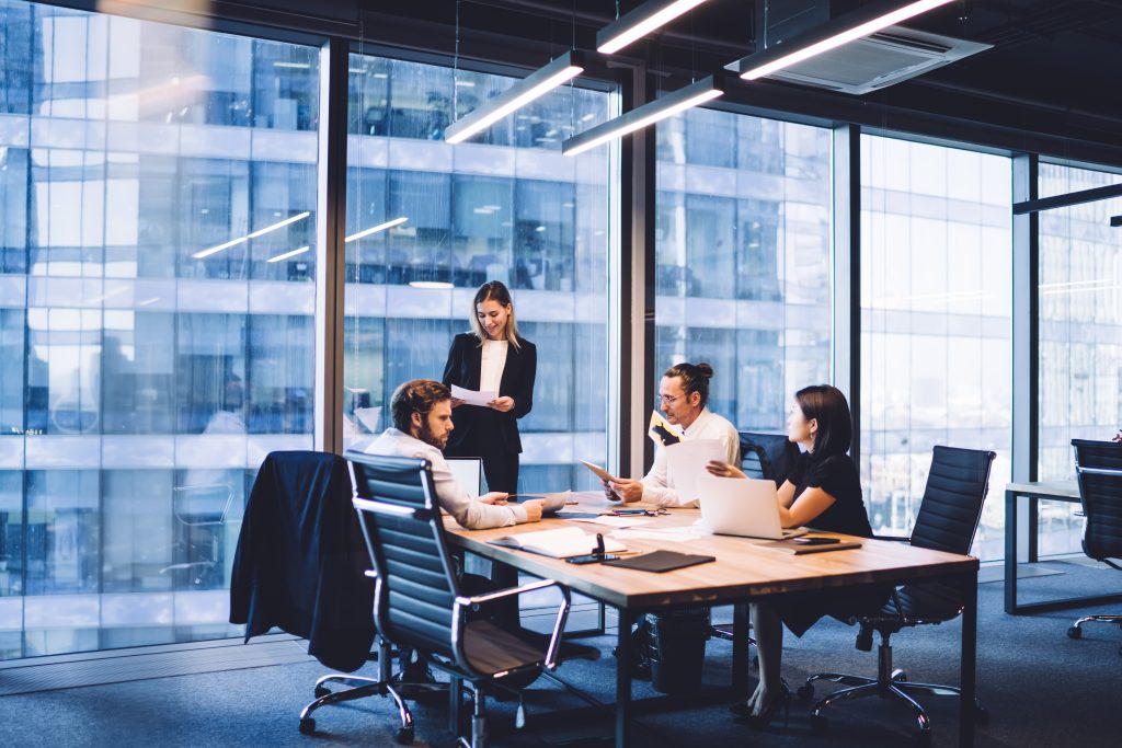 group of people in a corporate room